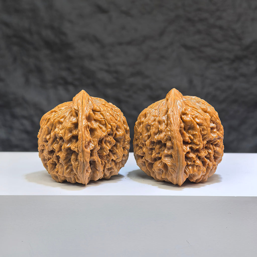 Hand-matched Wenwan Scholar Walnuts pair from Wenwan Art, 42mm, featuring classic triangular concave bottoms, Wenwan Walnut sculpture.