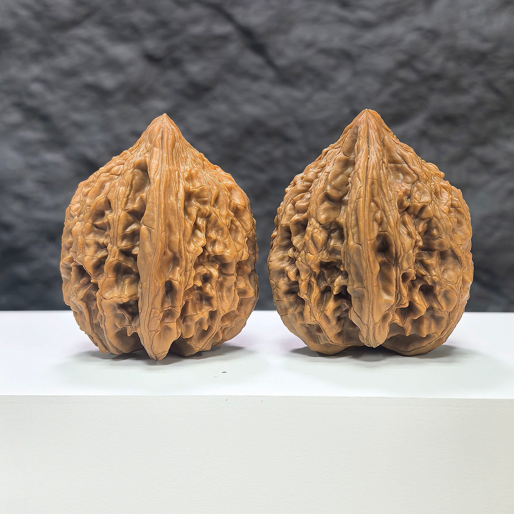 Pair of Classic Scholar Wenwan Walnuts from Wenwan Art, hand-matched stone walnuts, 42x43mm, showcasing detailed craftsmanship.