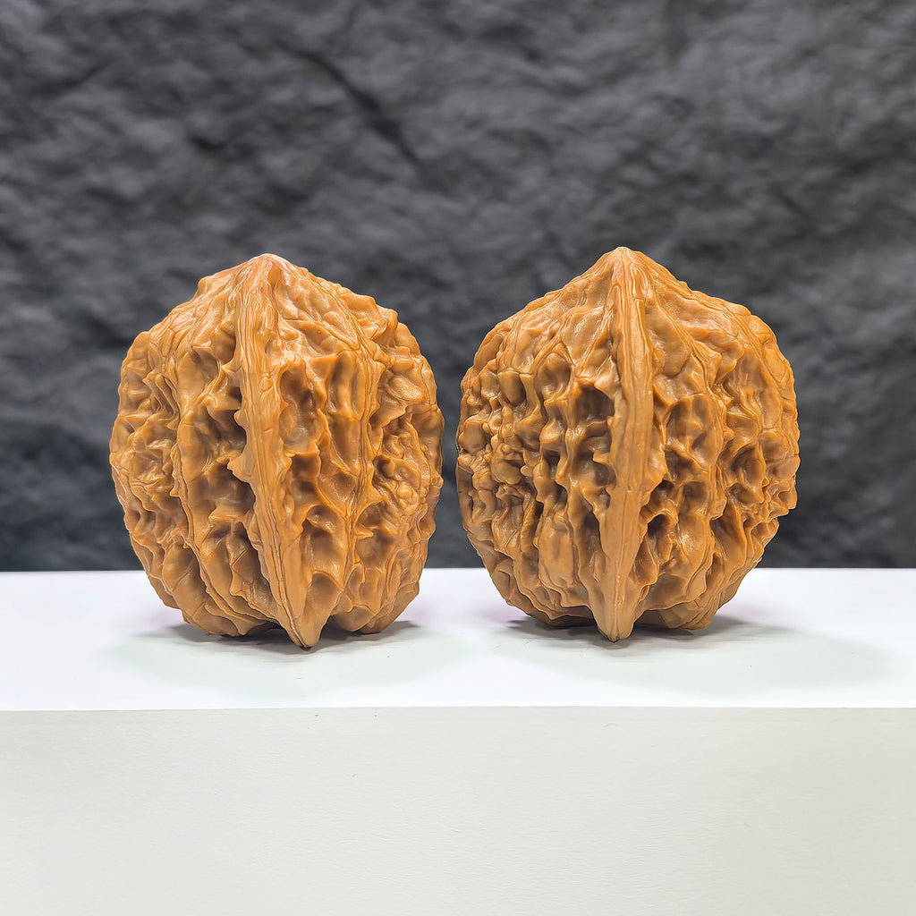 Pair of Beijing Chicken Heart Wenwan walnuts from Wenwan Art, featuring 43mm x 45mm natural walnut specimens.