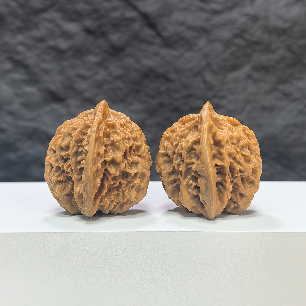 Pair of Xiayunling Classic Wenwan walnuts from Wenwan Art, 38mm x 37mm, showing detailed textured walnut shells.