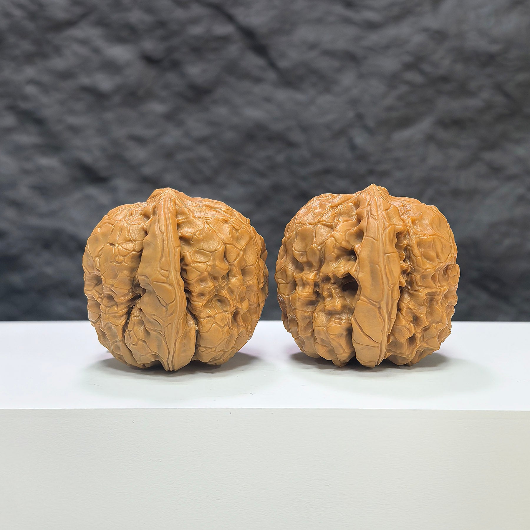 Pair of Classic Scholar Wenwan Walnuts by Wenwan Art, 39mm hand-matched walnuts with detailed carved patterns.