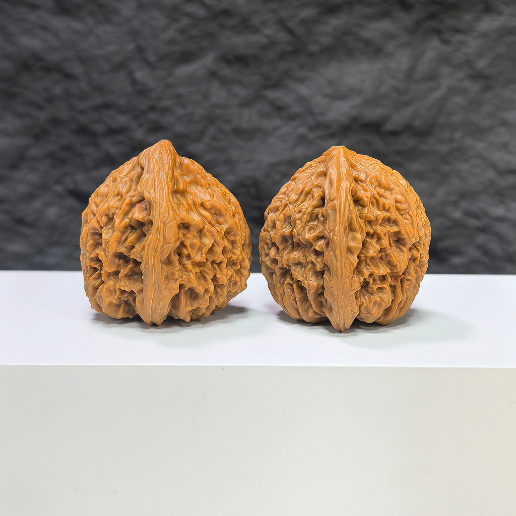Selected grade Tri-Angular Nanjiangstone Wenwan Walnut, 3.9×3.8cm, showcasing smooth texture and unique natural stone patterns.
