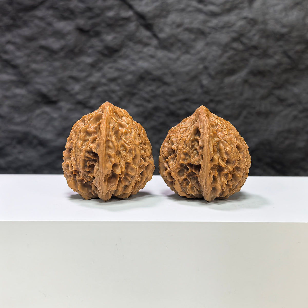 Pair of Golden Kylin Wenwan walnuts by Wenwan Art, 36mm each, featuring intricate golden dragon and kylin carvings on smooth walnut surfaces.