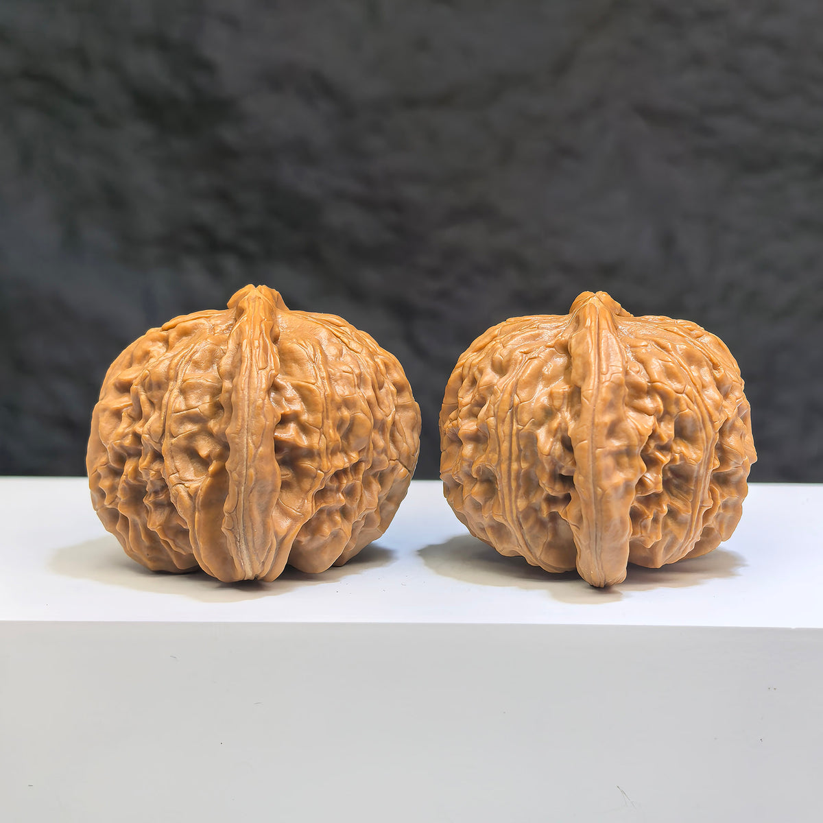 White Lion Wenwan Walnut pair by Wenwan Art, 41mm size, featuring detailed carvings of lion motifs on smooth white walnuts.