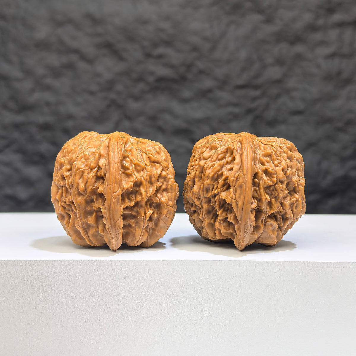 Pair of Wild Millstone Wenwan Walnuts by Wenwan Art, authentic wild walnuts with 36mm diameter, natural and textured surface.