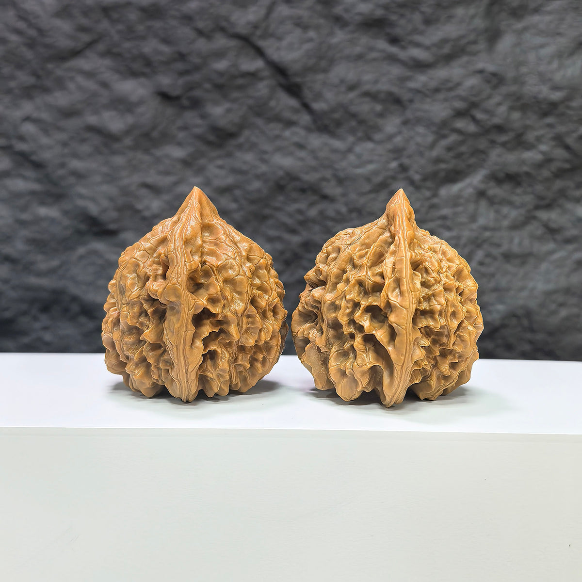 Official Wenwan Art classic walnut pair, 44mm x 42mm, featuring detailed craftsmanship and natural walnut grain.