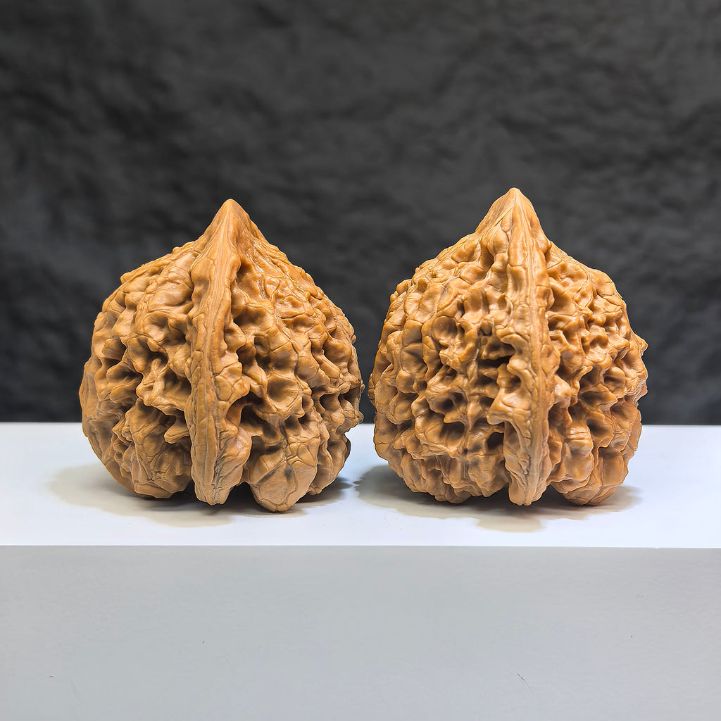Hand-matched Wenwan Scholar Walnuts pair by Wenwan Art, featuring 麒麟紋凹底 design, 47mm x 44mm size, traditional Chinese walnut set.