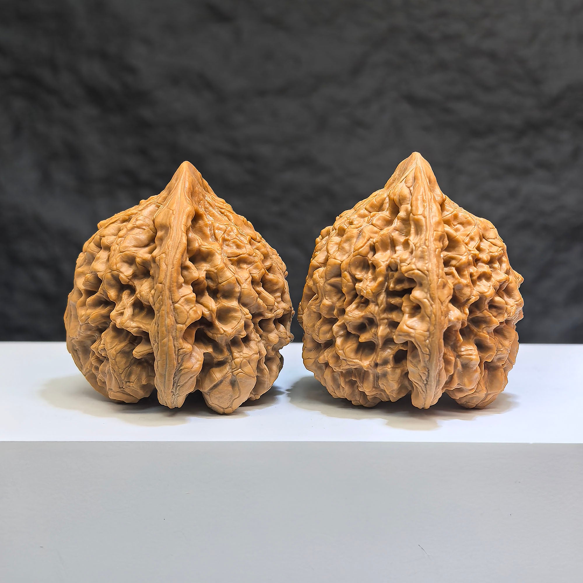 Hand-matched Wenwan Scholar Walnuts pair by Wenwan Art, featuring 麒麟紋凹底 design, 47mm x 44mm size, traditional Chinese walnut set.