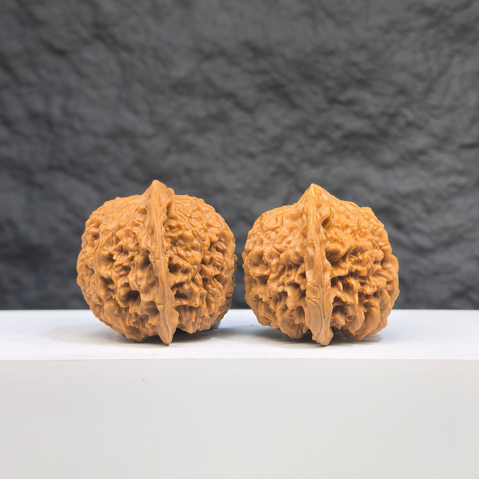 Pair of Babys Breath Full Stars Wenwan walnuts by Wenwan Art, 38mm x 37mm, featuring intricate star patterns on polished walnuts.
