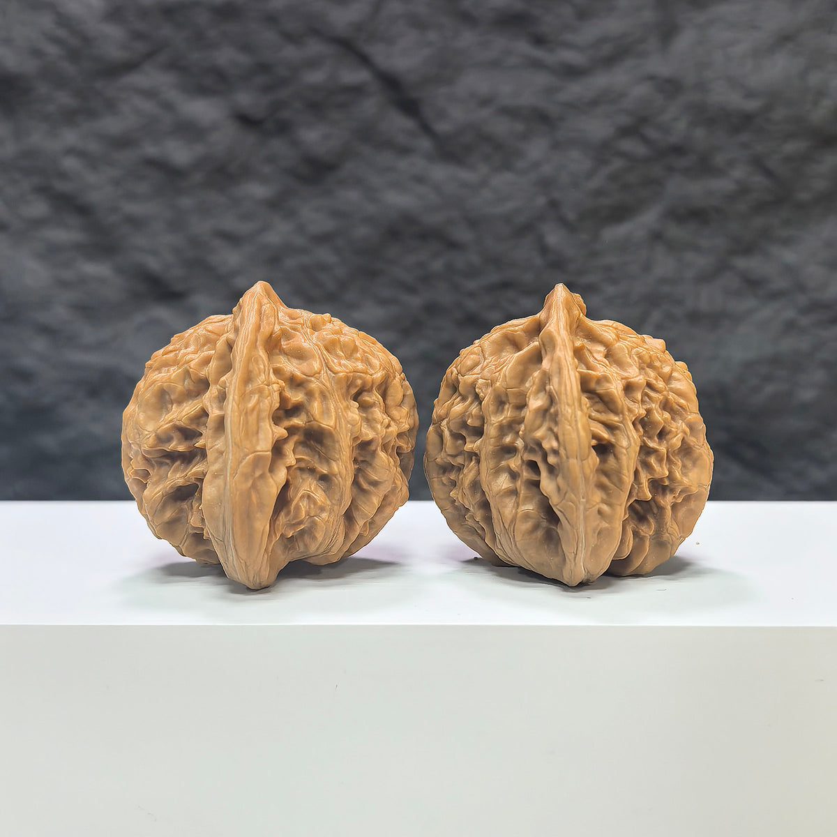 Pair of Peach Heart Concave Base Wenwan walnuts from Wenwan Art featuring deep-base design and natural wood grain pattern.