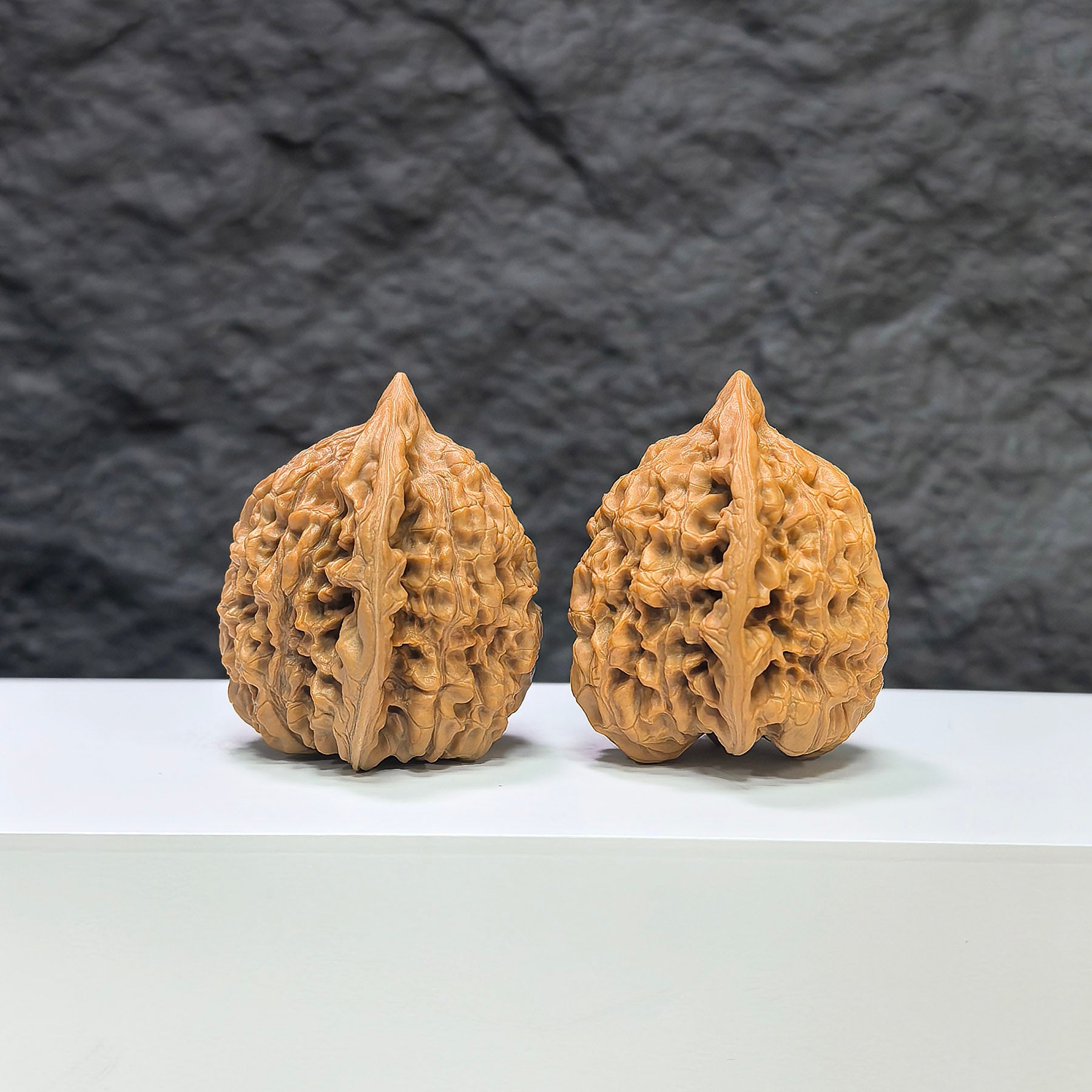Pair of Wenwan Art Kylin Texture Classic Wenwan Walnuts, featuring 麒麟紋 pattern, 39mm x 35mm, detailed natural wood grain.