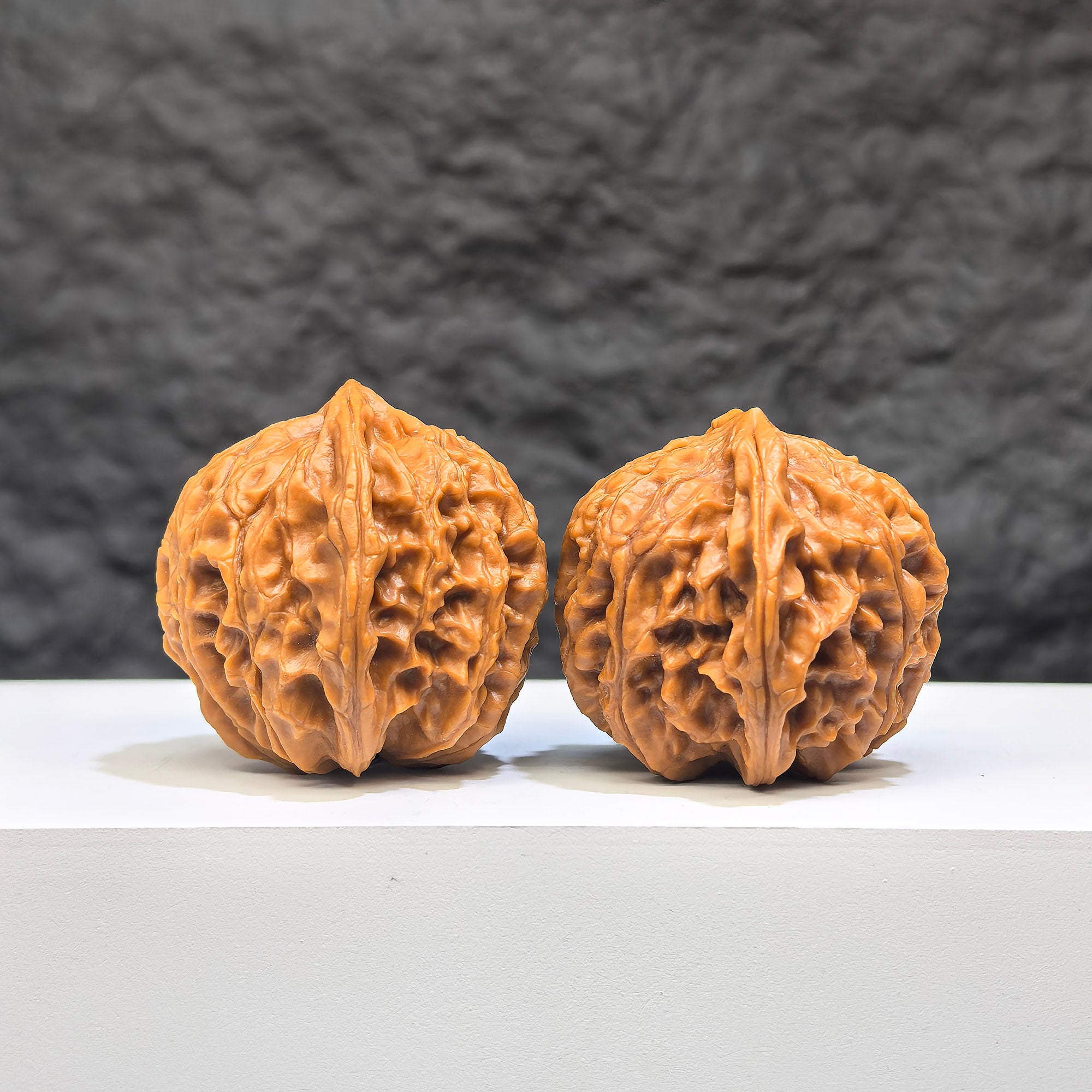 Pair of Dragon Scale Wenwan Walnuts from Wenwan Art, 36mm, featuring intricate dragon scale patterns on smooth walnut surfaces.