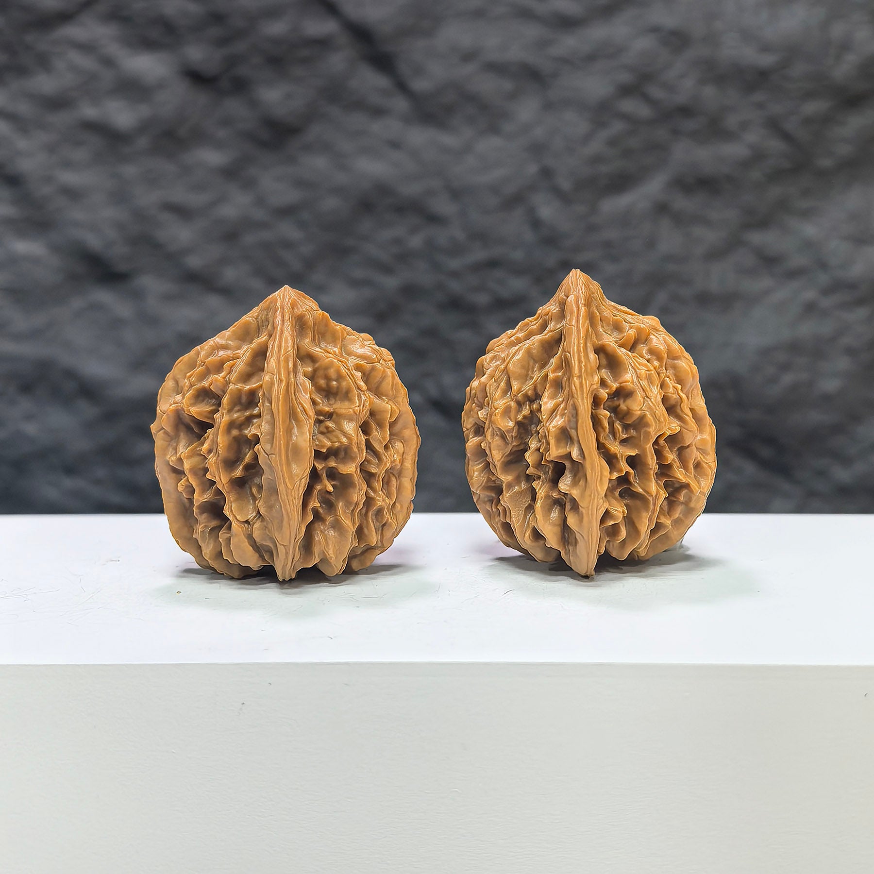 Wenwan Art "Tongtian Eight" classic Wenwan walnut pair, 33mm, featuring intricate carvings on natural walnut wood.