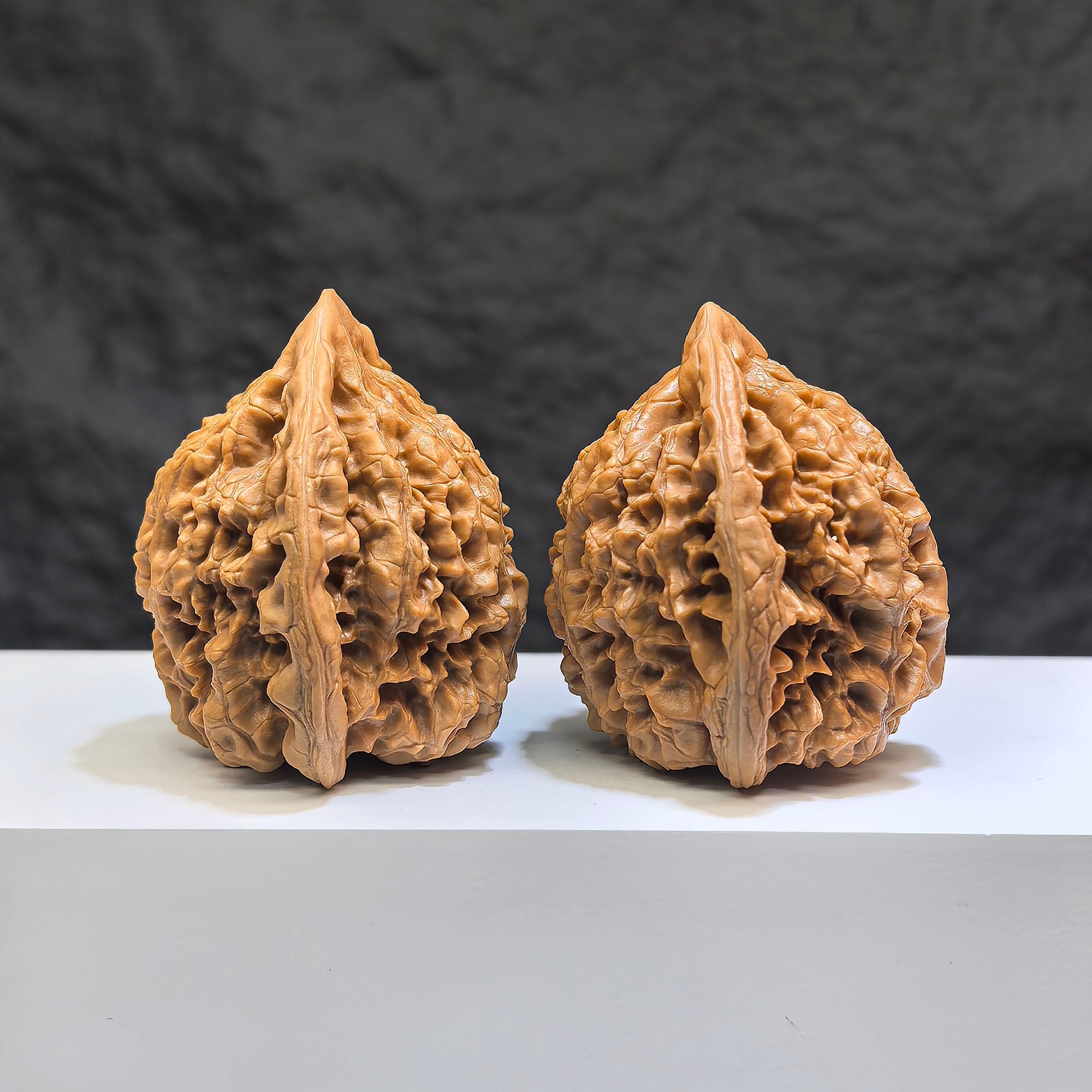 Pair of Classic Scholar Wenwan Walnuts by Wenwan Art, 47mm x 43mm, featuring 桃心凹底麒麟紋 pattern, hand-matched and detailed.