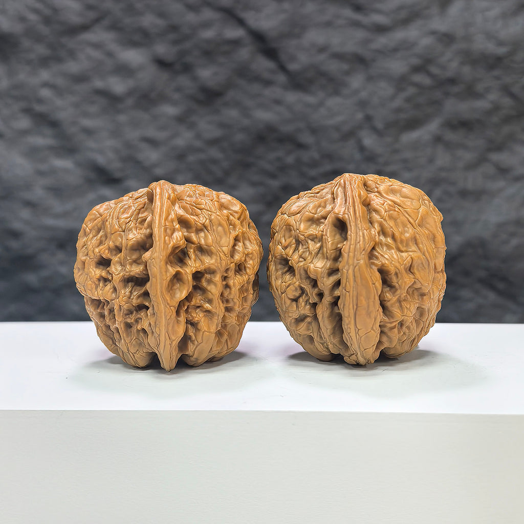 Pair of North China General Shoulder Wenwan walnuts from Wenwan Art, 40mm size, featuring smooth, polished walnut shells.
