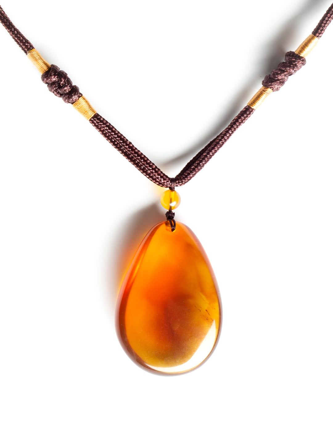 Authentic brownish-red freeform amber pendant with natural shape, 12g, showcasing warm, translucent amber stone.