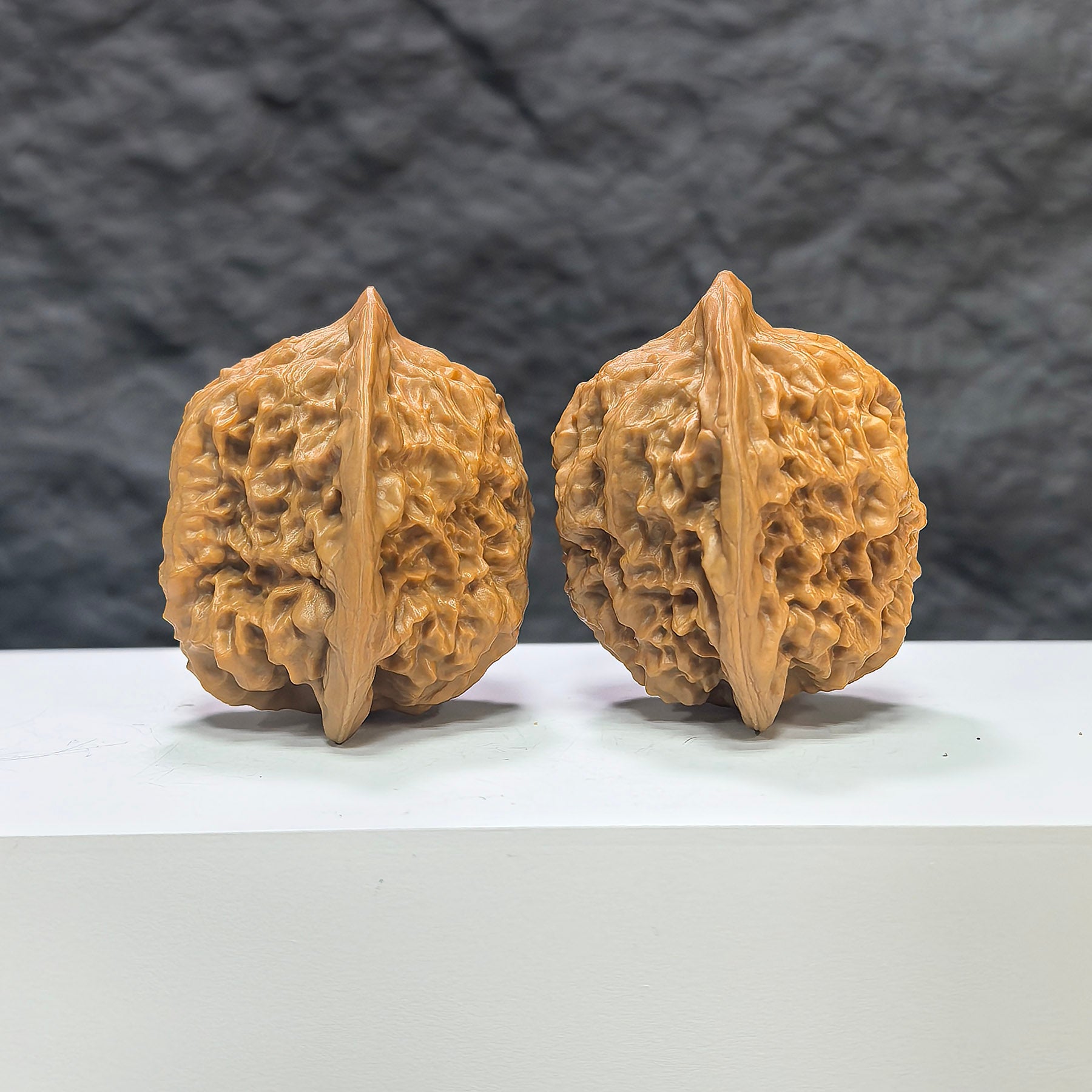 Pair of Arhat Head Wenwan Walnuts from Wenwan Art, round profile, 41mm x 38mm, showcasing detailed natural walnut textures.