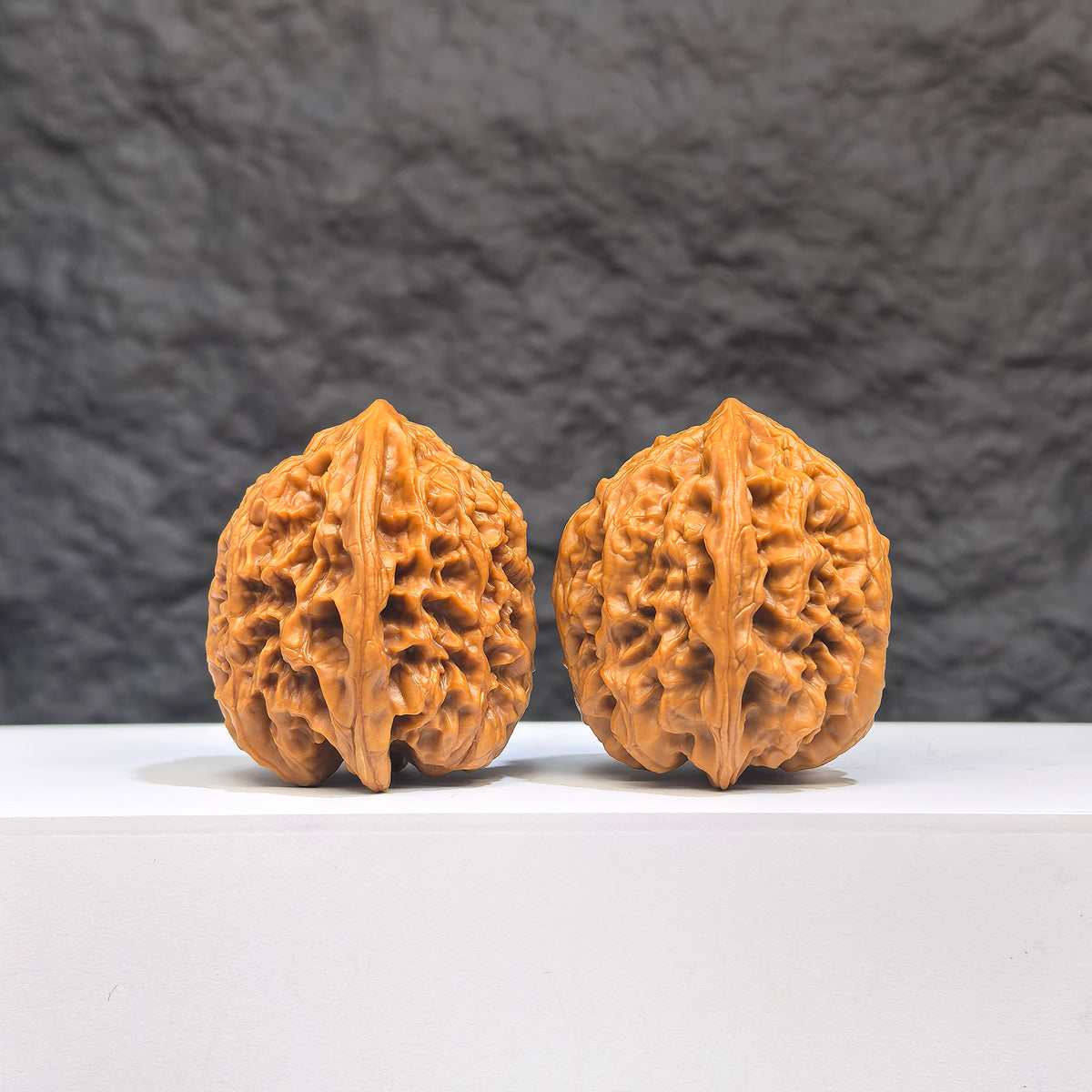 Selected grade Wenwan walnut from Wenwan Art, small bison pattern, measuring 3.5×3.3cm, detailed wood grain and craftsmanship.