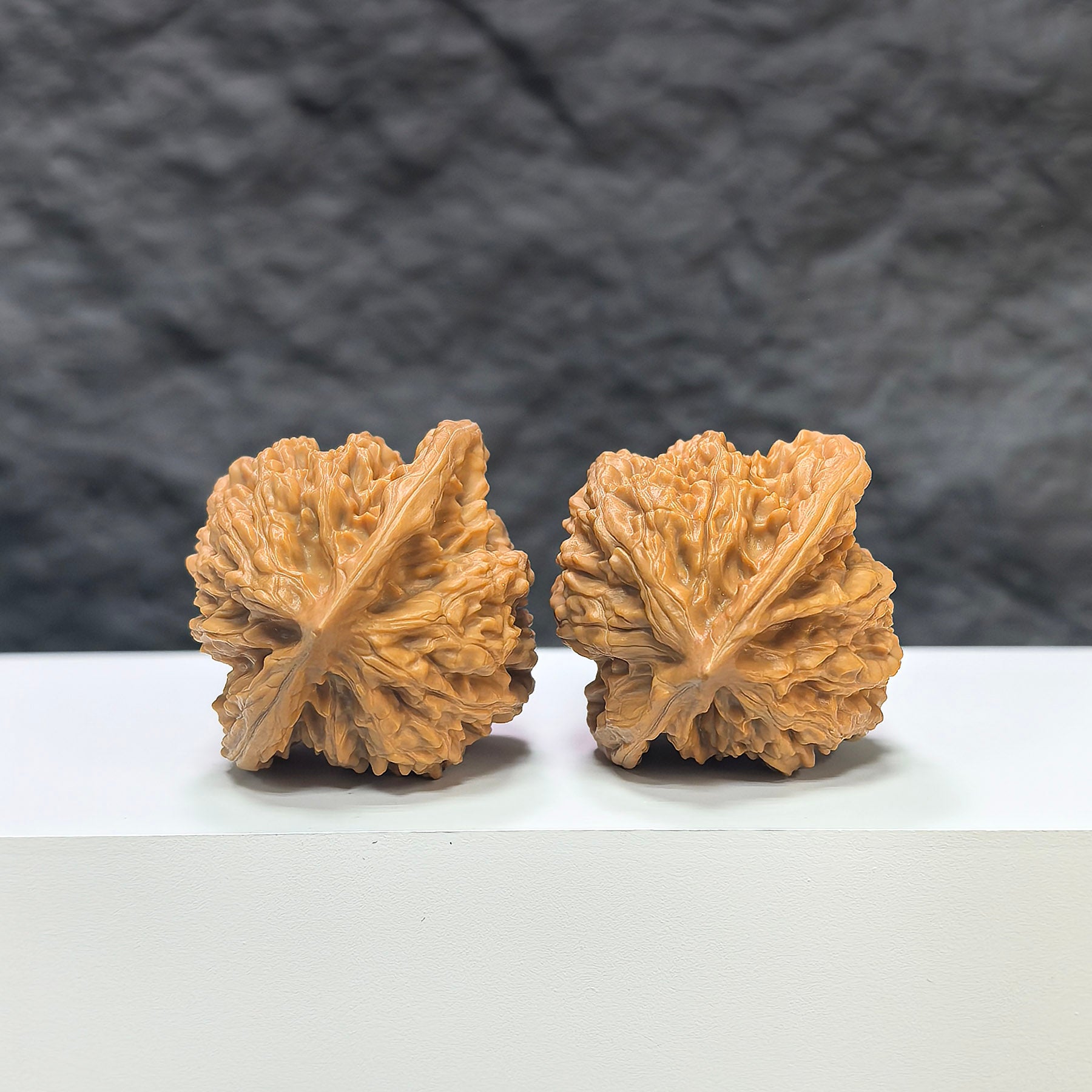 Pair of Peach Heart Concave Base Wenwan walnuts by Wenwan Art, featuring deep bases and natural peach heart shape, 39mm x 37mm.