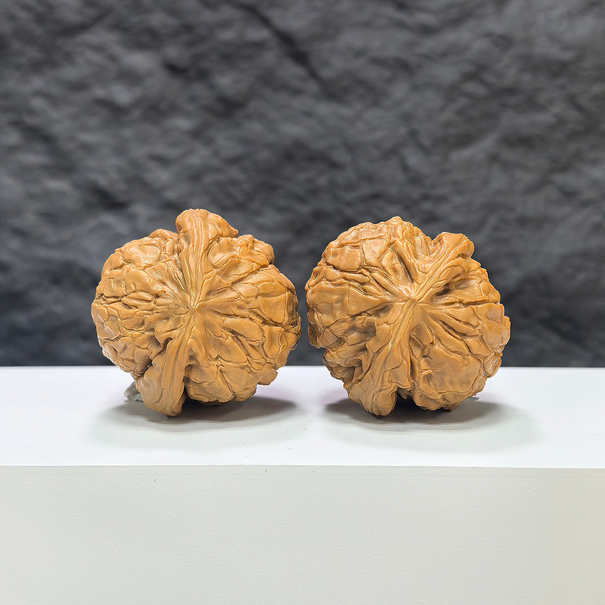 Pair of Classic Scholar Wenwan Walnuts from Wenwan Art, hand-matched 39mm Wenwan walnut set with intricate carvings.