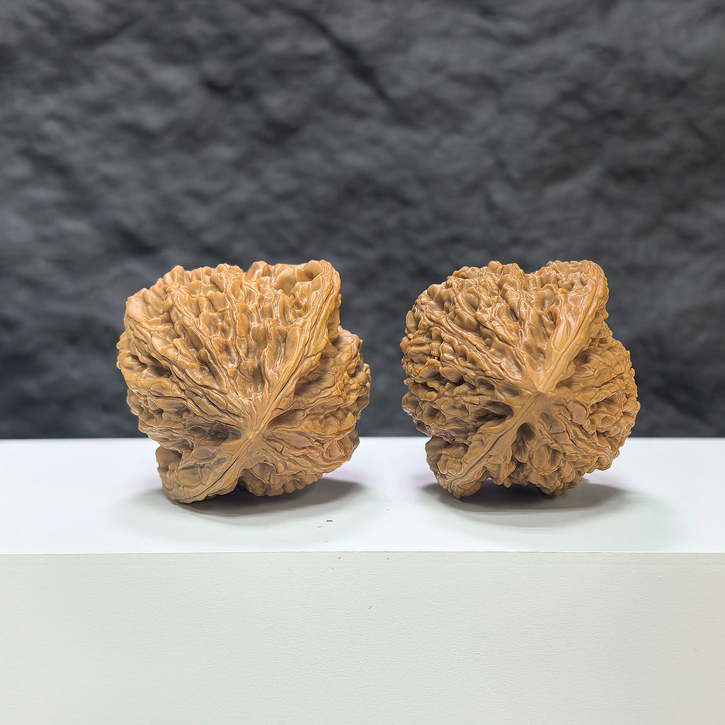 Pair of Classic Scholar Wenwan Walnuts by Wenwan Art, featuring 桃心虎頭王 design, 44mm x 42mm, hand-matched walnut sculptures.