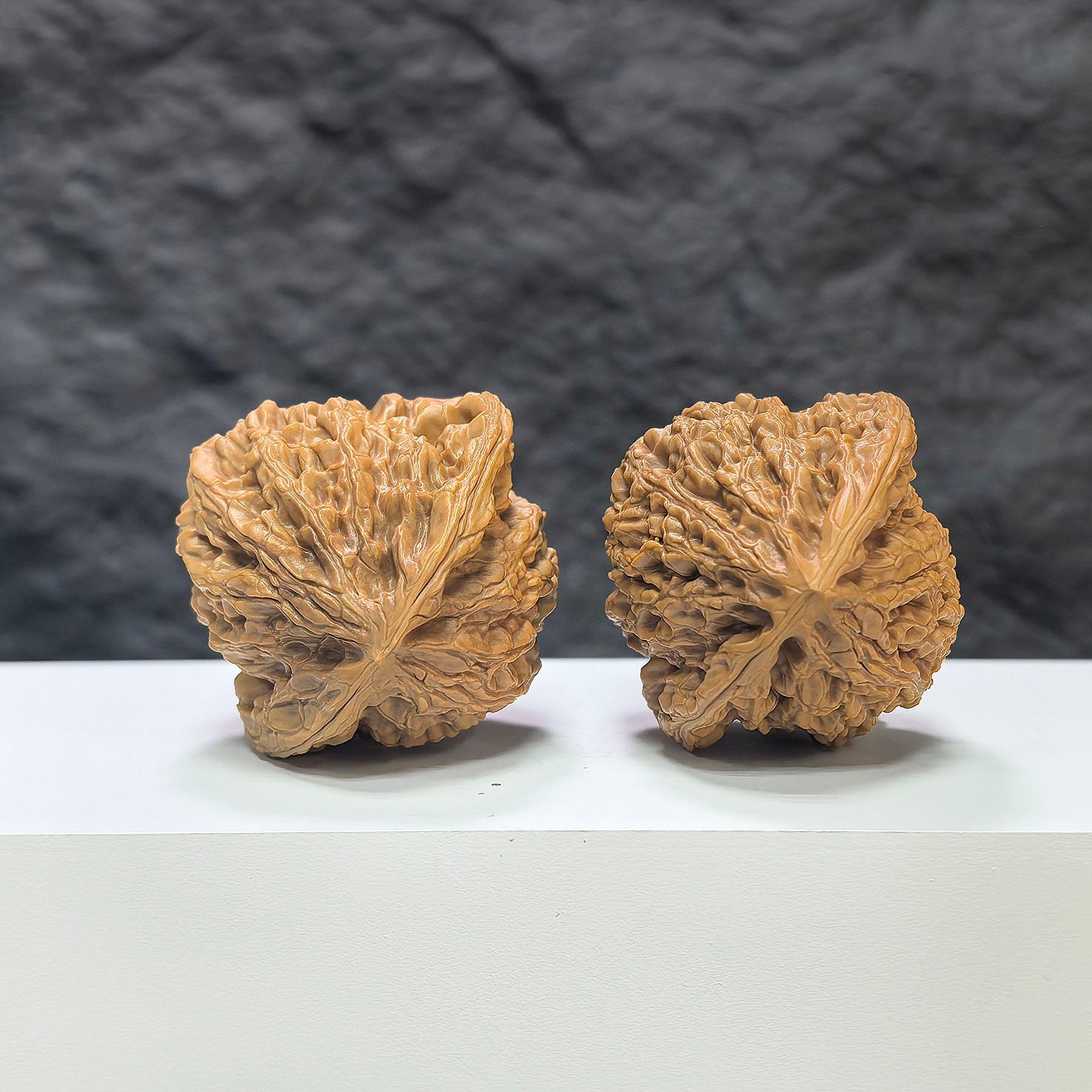 Pair of Classic Scholar Wenwan Walnuts by Wenwan Art, featuring 桃心虎頭王 design, 44mm x 42mm, hand-matched walnut sculptures.