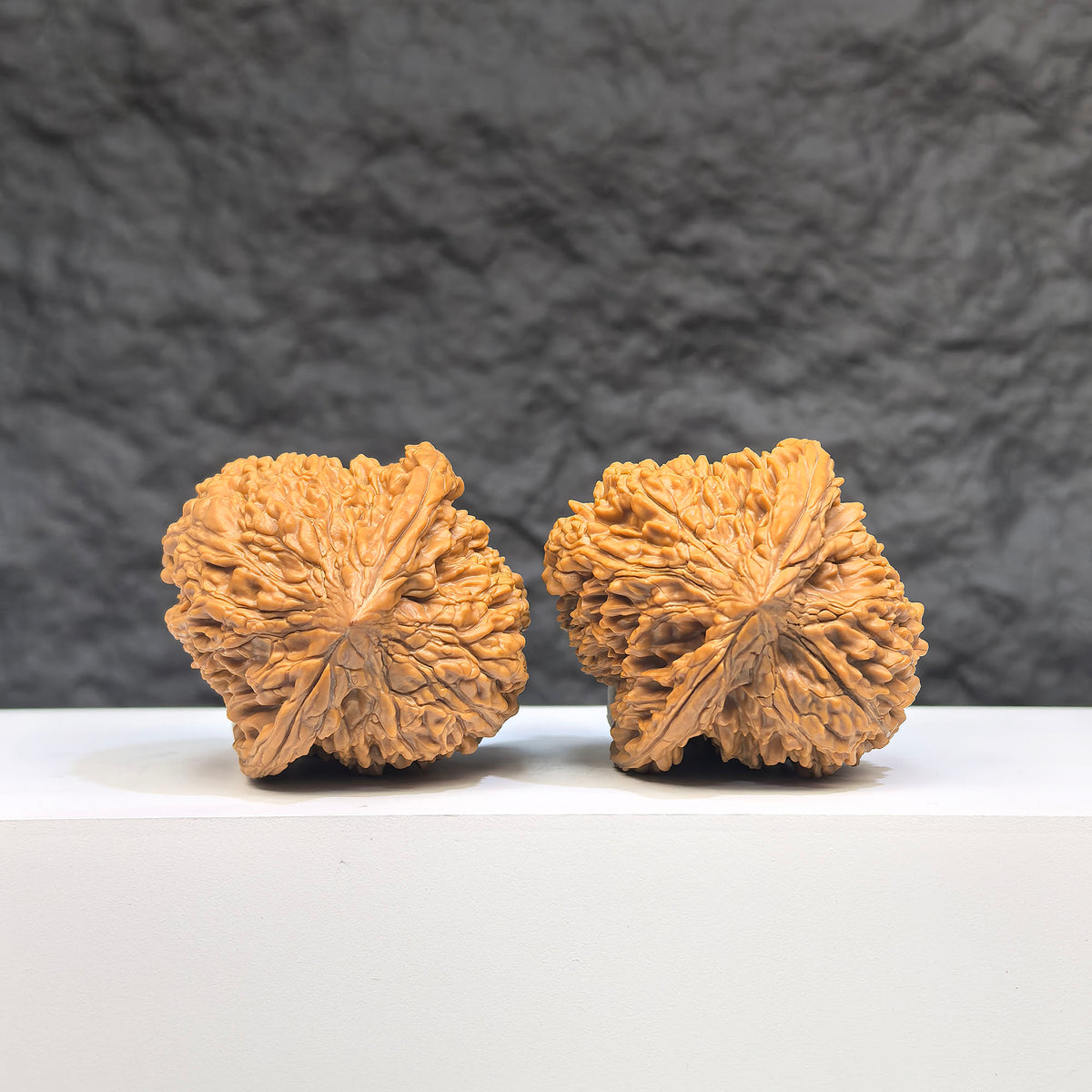 Pair of Peach Heart Concave Base Wenwan Walnuts with full star patterns, 40mm x 42mm, from Wenwan Art, featuring intricate natural wood grain.