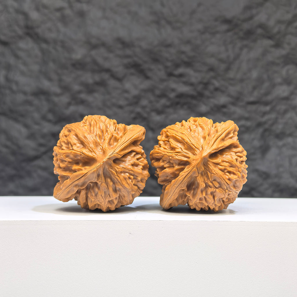 Pair of Peach Heart Palace Lantern Wenwan Walnut art pieces from Wenwan Art, featuring intricate peach heart designs, 42mm x 38mm.