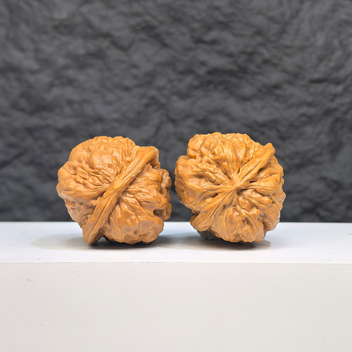 Wenwan Art Toad Crystal Frog Wenwan Walnut pair, 32mm x 34mm, featuring detailed frog and toad crystal carvings.