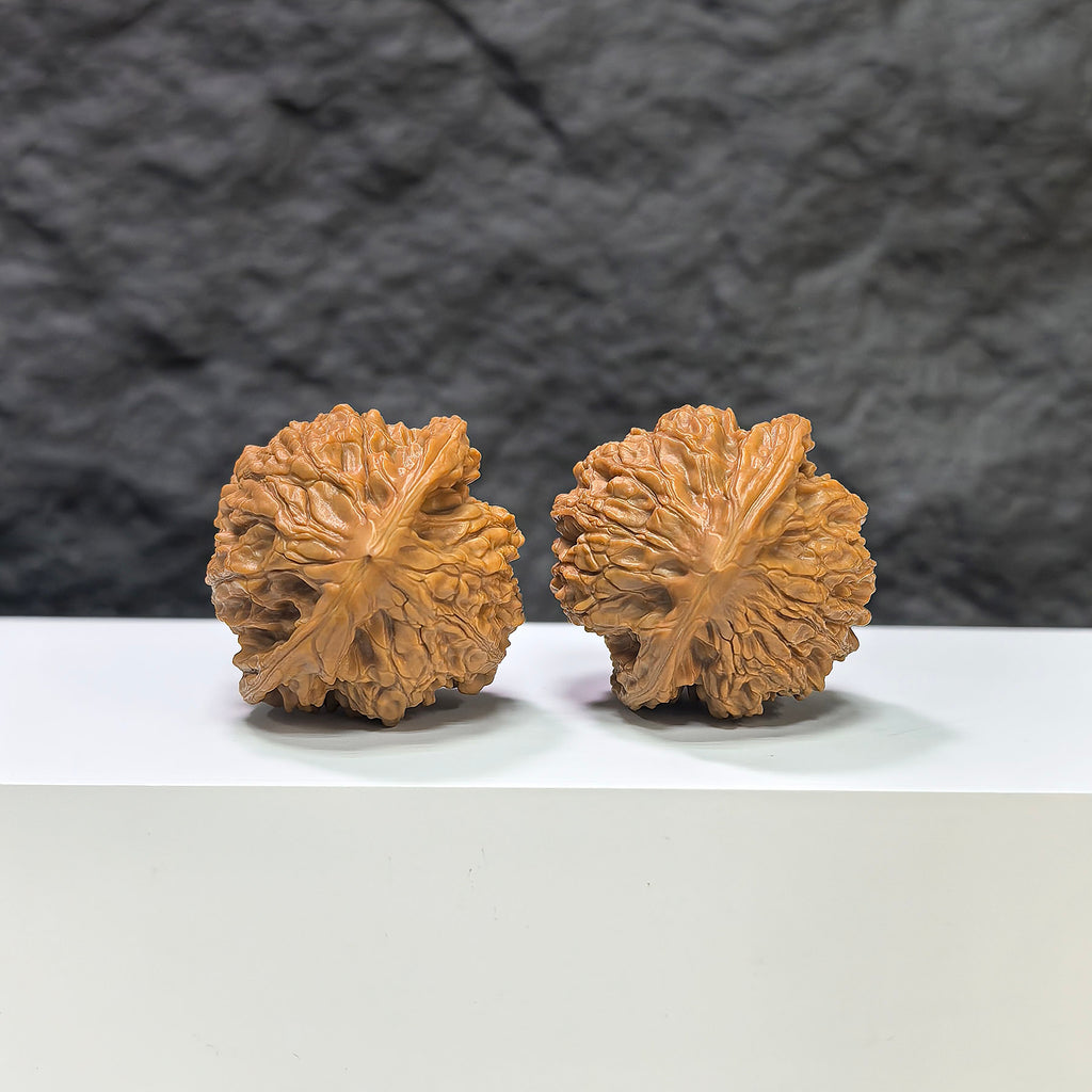 Golden Kylin Wenwan walnut pair from Wenwan Art, 36mm classic Chinese carved walnuts with intricate details.