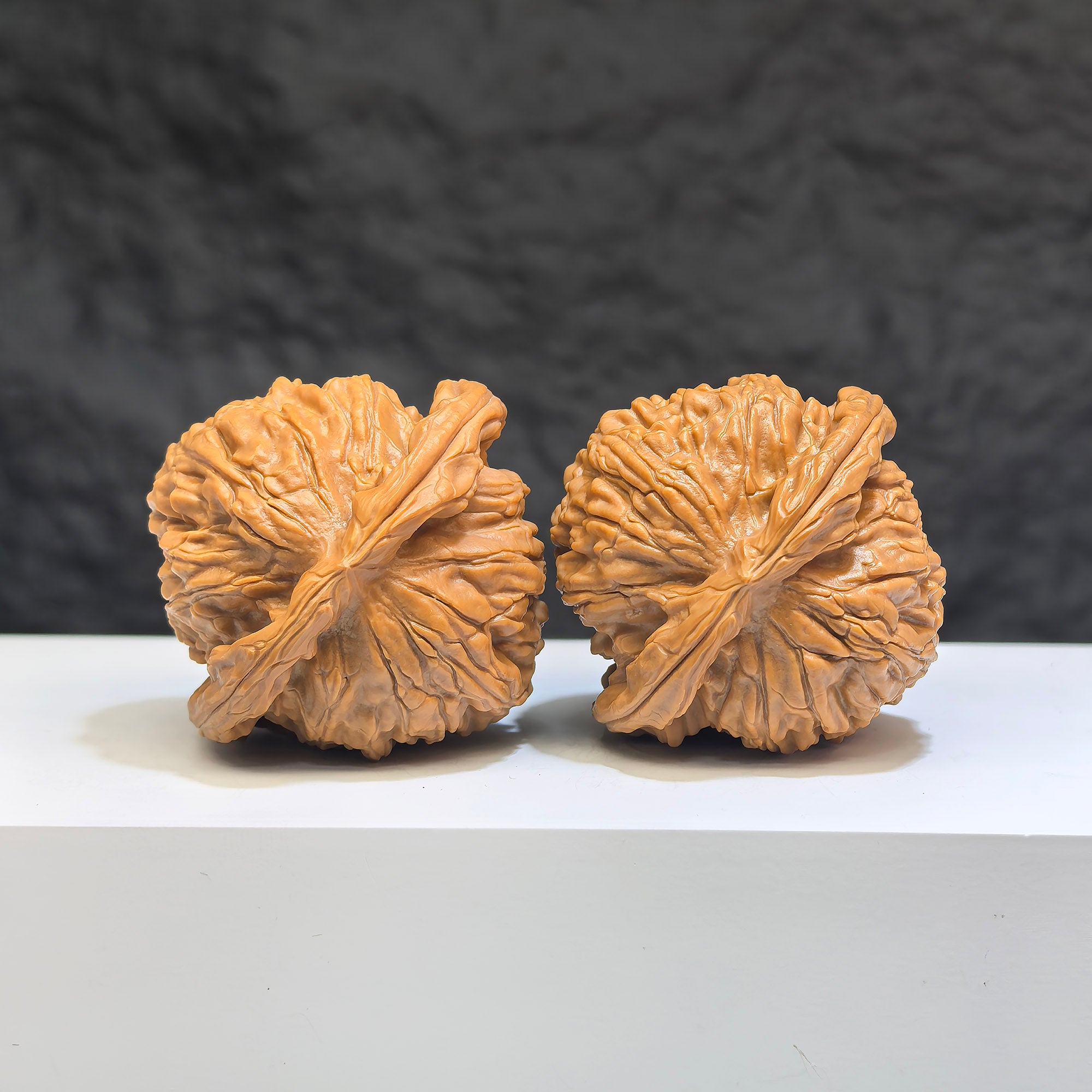 White Lion Wenwan Walnut pair by Wenwan Art, featuring 41mm classic Wenwan walnuts with detailed carvings and natural wood grains.