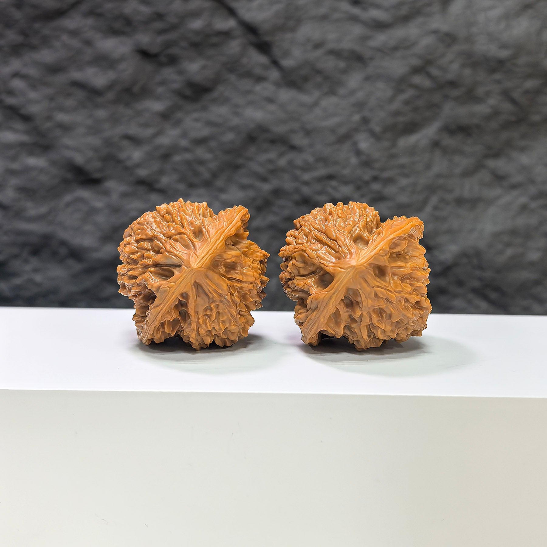 Golden Kylin Wenwan Walnut pair by Wenwan Art, 37mm x 38mm, featuring intricate carvings of mythical Kylin figures.
