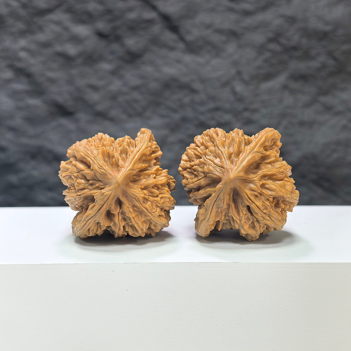 Pair of Xiayunling Peach Heart Concave Base Wenwan walnuts from Wenwan Art, 41mm x 40mm, showcasing detailed natural walnut surfaces.