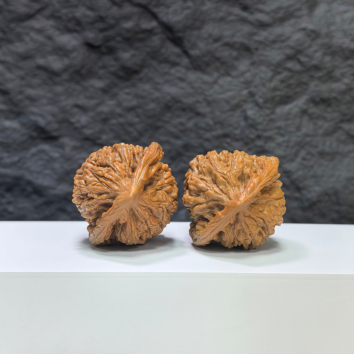 Pair of Kylin Texture Wenwan Walnuts by Wenwan Art, featuring 麒麟紋 pattern, 40mm x 37mm, natural wood finish.