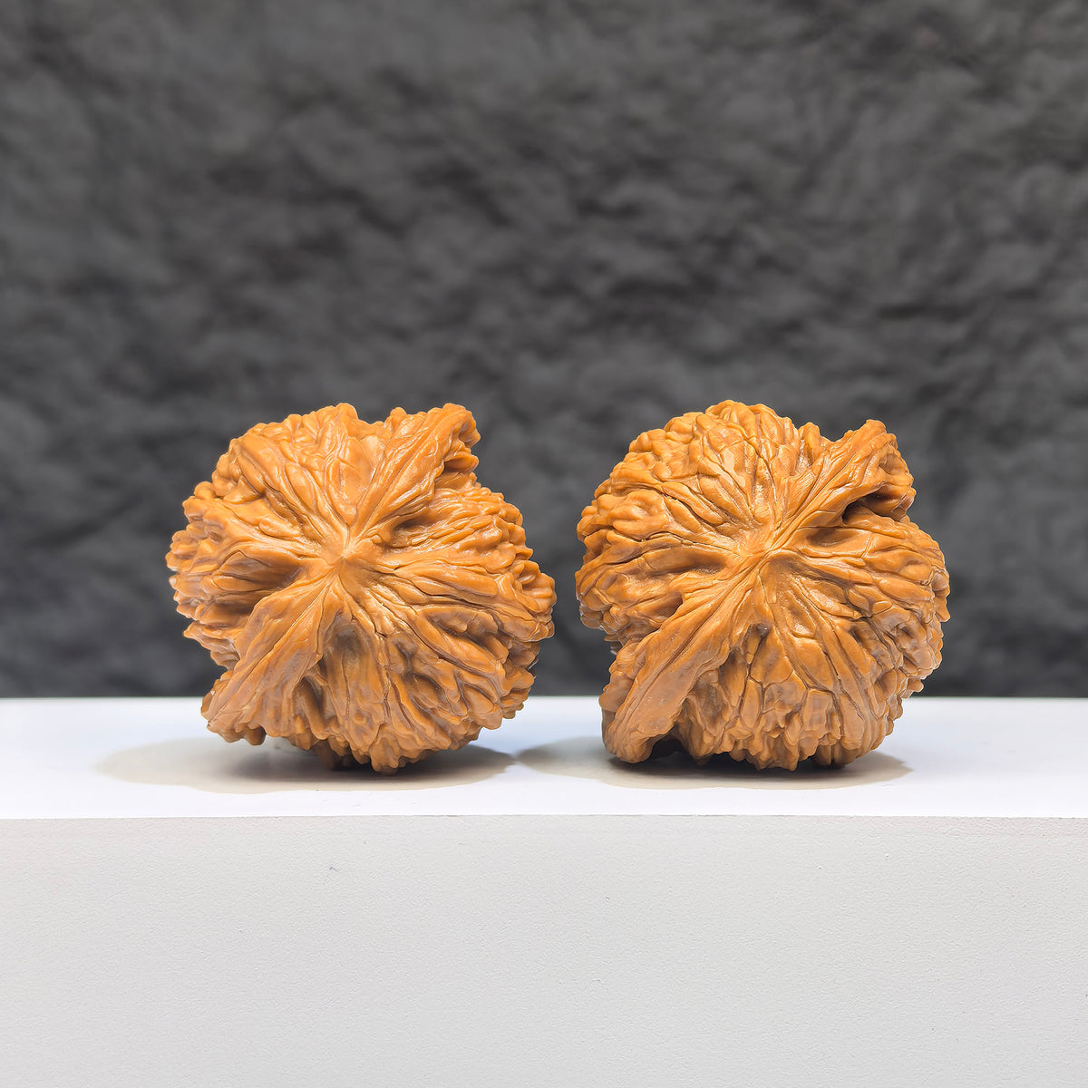 Pair of Wenwan Art Millstone Classic Wenwan Walnuts, 37mm x 35mm, featuring intricate details and smooth polished surface.