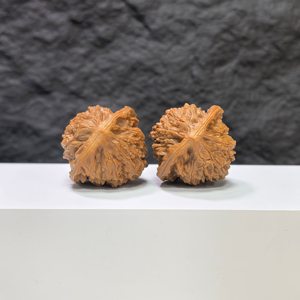 Golden Kylin Wenwan Walnut pair by Wenwan Art, featuring intricate carvings, measuring 37mm x 36mm, showcasing detailed craftsmanship.
