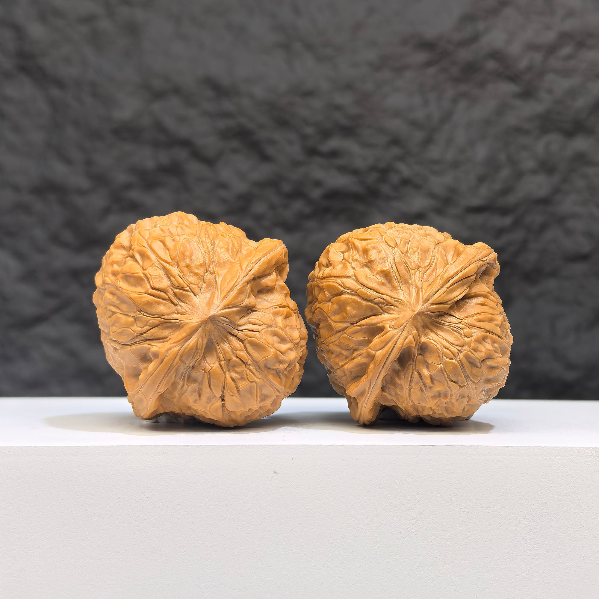 Pair of deep-base Wenwan walnuts with concave pumpkin-shaped bases, 40mm x 42mm, from Wenwan Art.
