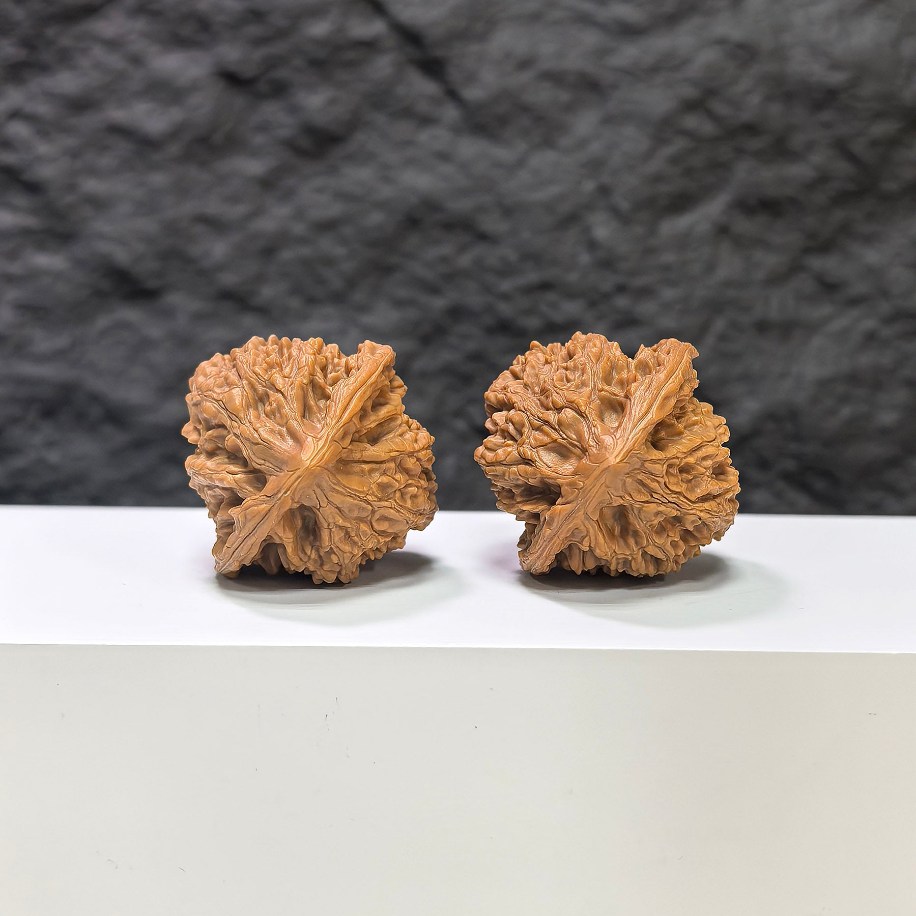 Pair of Golden Kylin Wenwan walnuts by Wenwan Art, showcasing their 36x37mm size, detailed natural walnut textures, and golden hue.
