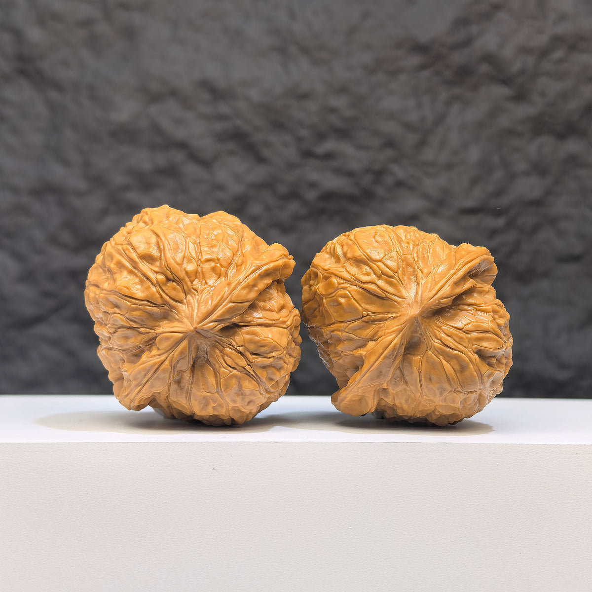 Pair of Pumpkin Pier Wenwan walnuts from Wenwan Art, featuring 40mm x 42mm carved classic pumpkin shapes.