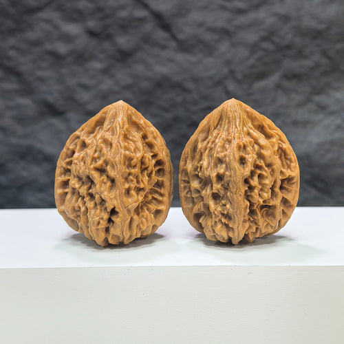Pair of Beijing Chicken Heart Wenwan walnuts from Wenwan Art, showing detailed natural walnut surface and size of 37mm x 38mm.
