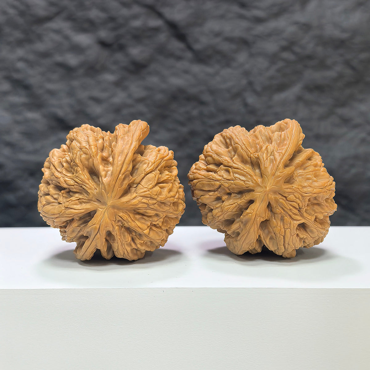 Pair of Wenwan Art Classic Scholar hand-matched Wenwan walnuts with 45mm size, showcasing natural texture and craftsmanship.