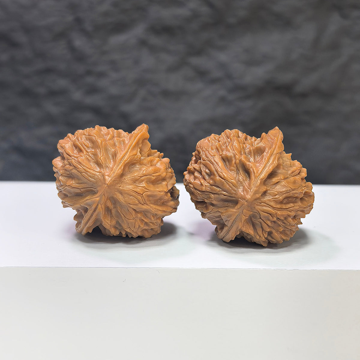 Wenwan Art Pocket Phoenix Tail miniature Wenwan walnuts pair, 30mm x 31mm, featuring intricate craftsmanship and natural walnut texture.