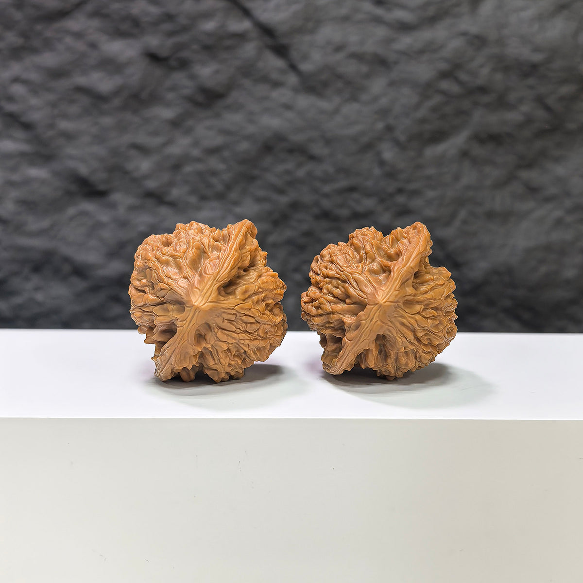 Golden Kylin Wenwan Walnut pair by Wenwan Art, 36mm x 34mm, featuring intricate natural wood grain and smooth polished surfaces.