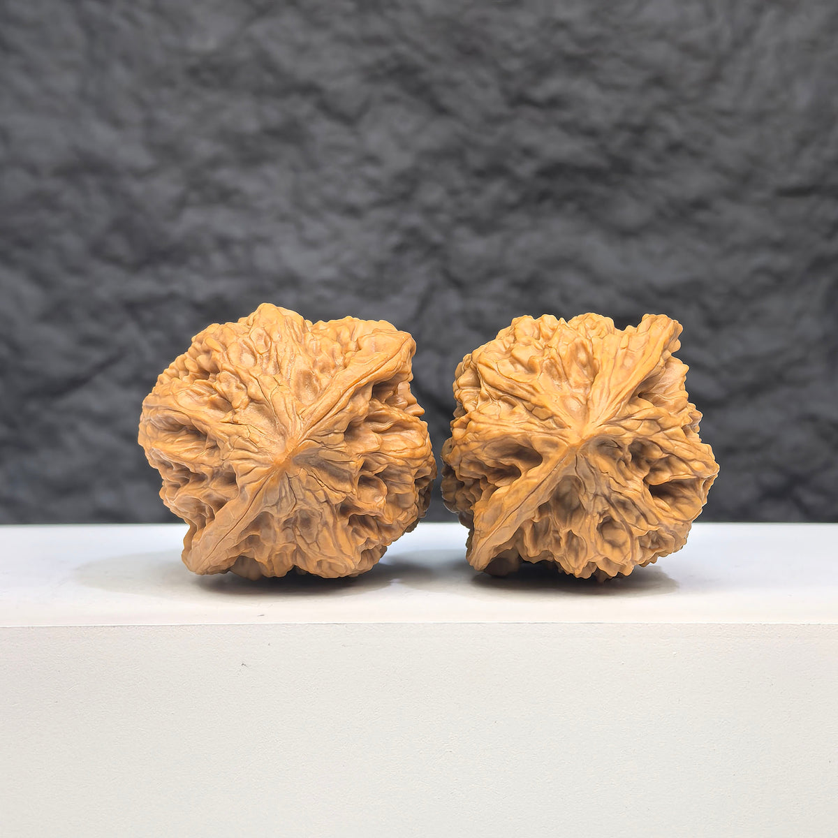 Selected grade Wild Bison Walnut from Wenwan Art, 3.8x3.6cm, showcasing smooth surface and rich natural wood grain details.