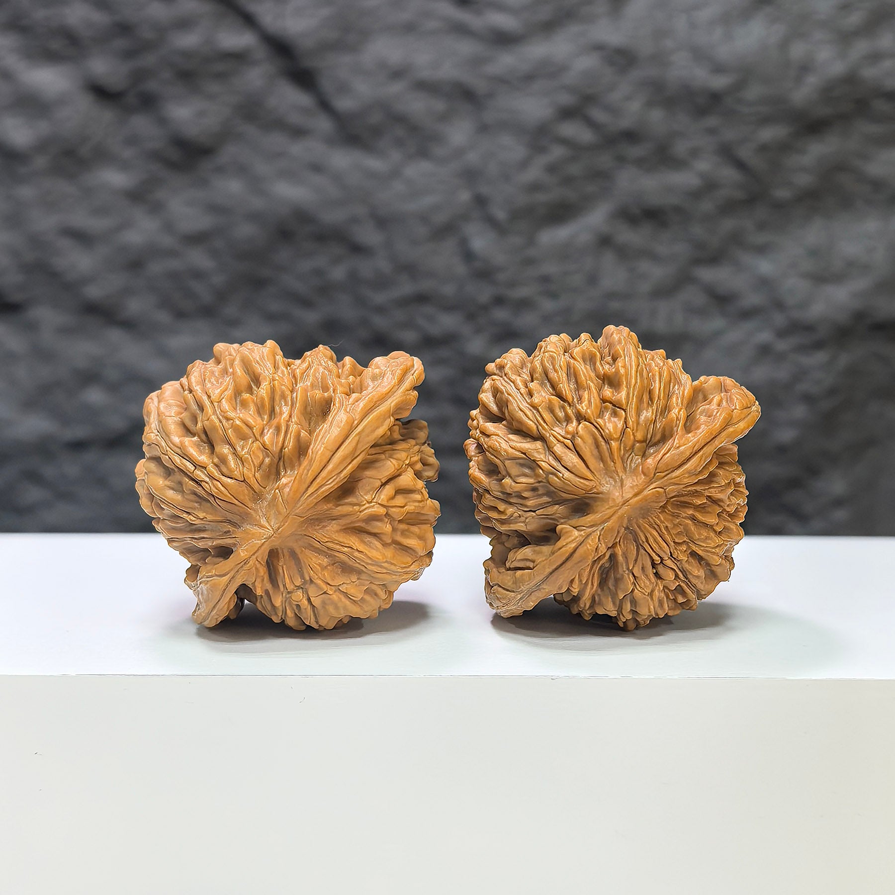 Pair of Sizuolou Wenwan Walnuts by Wenwan Art, classic 41mm x 39mm walnuts with intricate natural wood grain details.