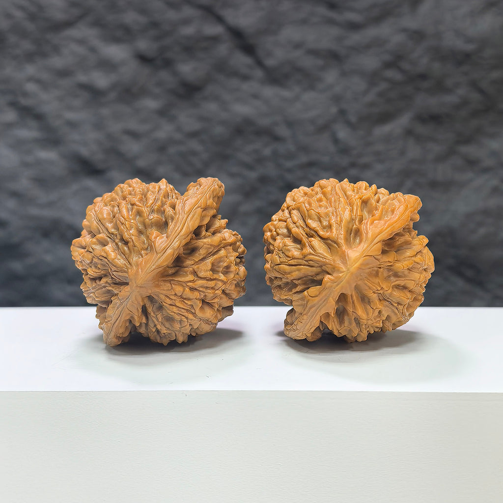 Wenwan Art official hat-shaped Wenwan walnut pair, 44mm x 41mm, showcasing detailed craftsmanship and natural walnut textures.