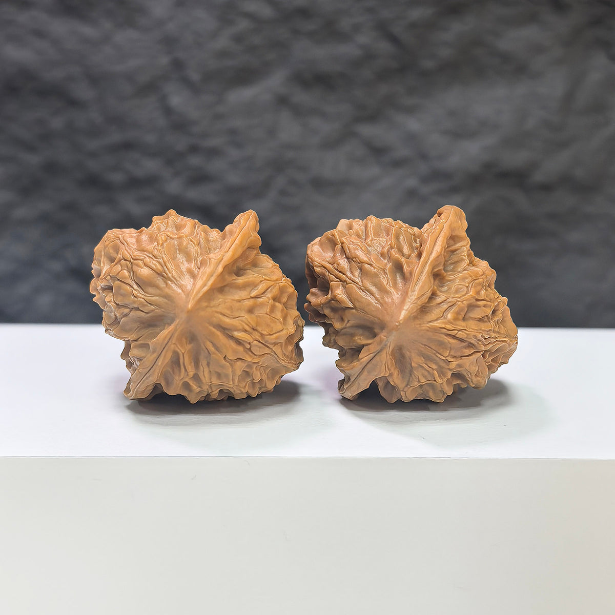 Wenwan Art Linglong x White Snake Valley Classic Wenwan Walnut pair, 33mm x 35mm, featuring detailed natural walnut surfaces.