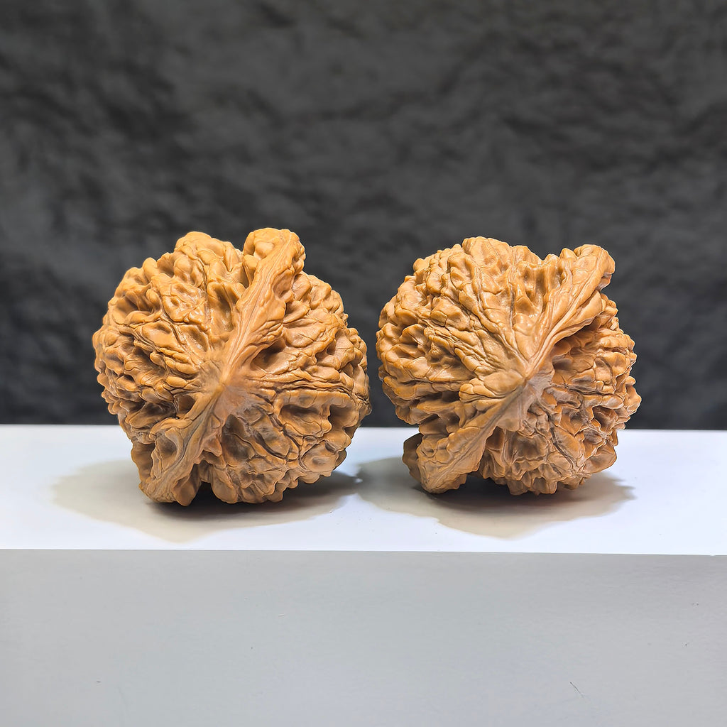 Pair of Classic Scholar Wenwan Walnuts by Wenwan Art, 47mm x 44mm, featuring 麒麟紋凹底 pattern and hand-matched design.