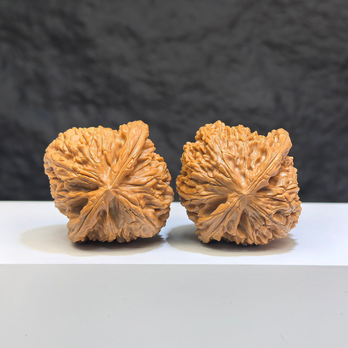 White Lion Wenwan Walnut pair from Wenwan Art, 39mm classic Chinese carved walnut figurines with intricate details and natural wood grain.