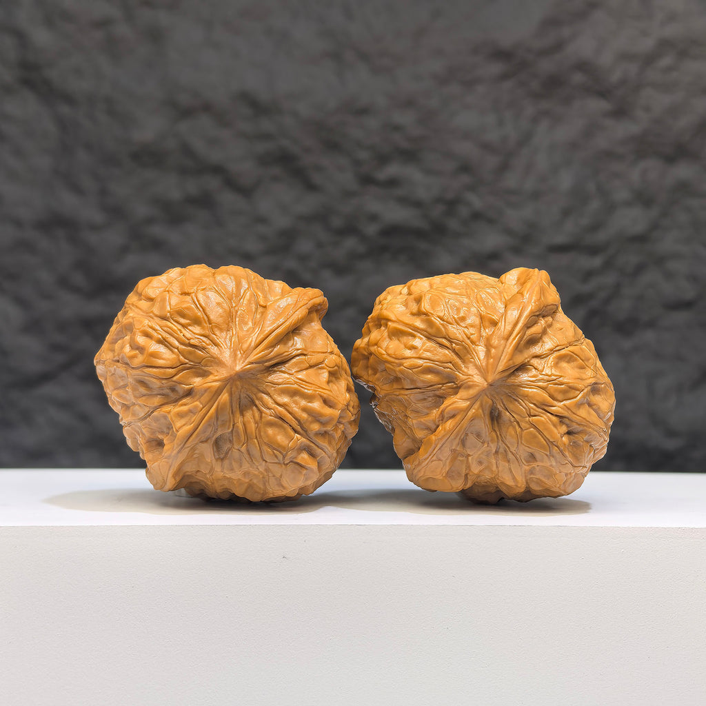 Pair of Small Pumpkin Pier Wenwan Walnuts from Wenwan Art, miniature walnuts measuring 38x40mm, with detailed carved pumpkin design.